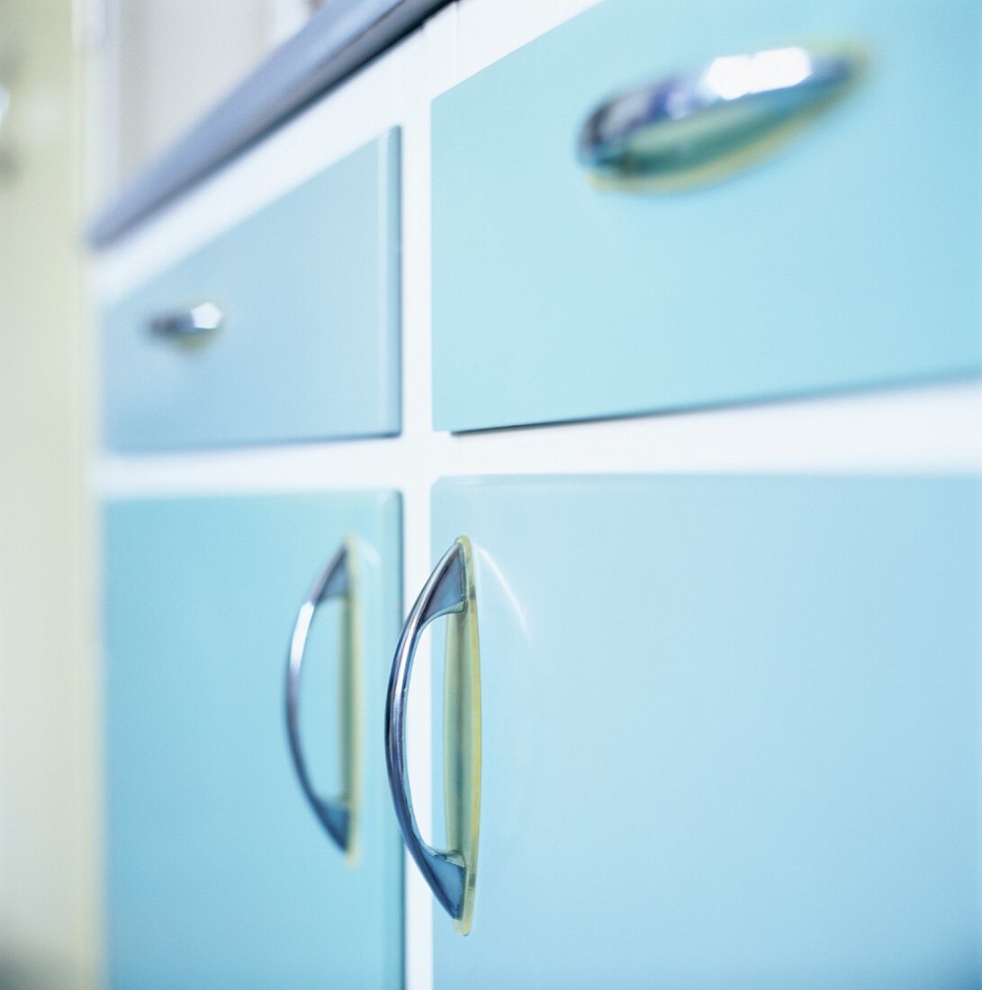 Chrome handles on cupboard doors