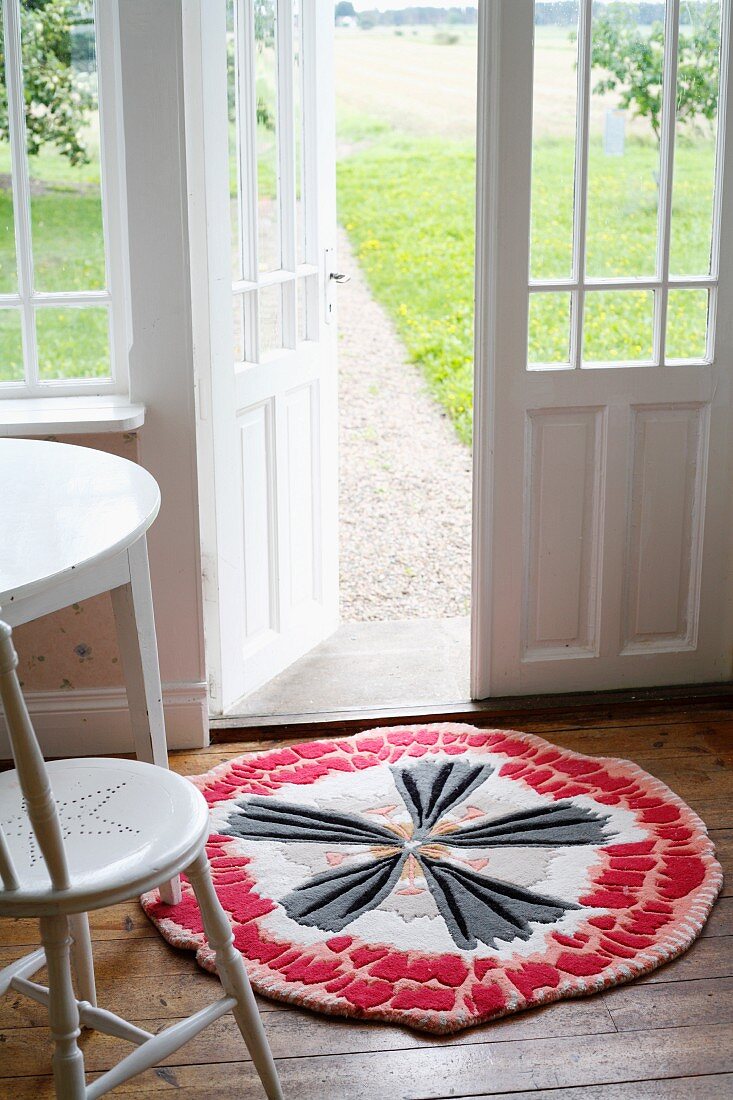 Carpet in front of a front door