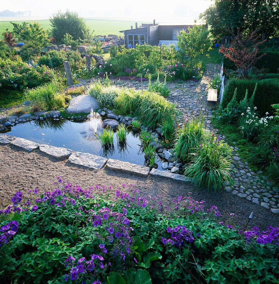 Garden pond with a fountain