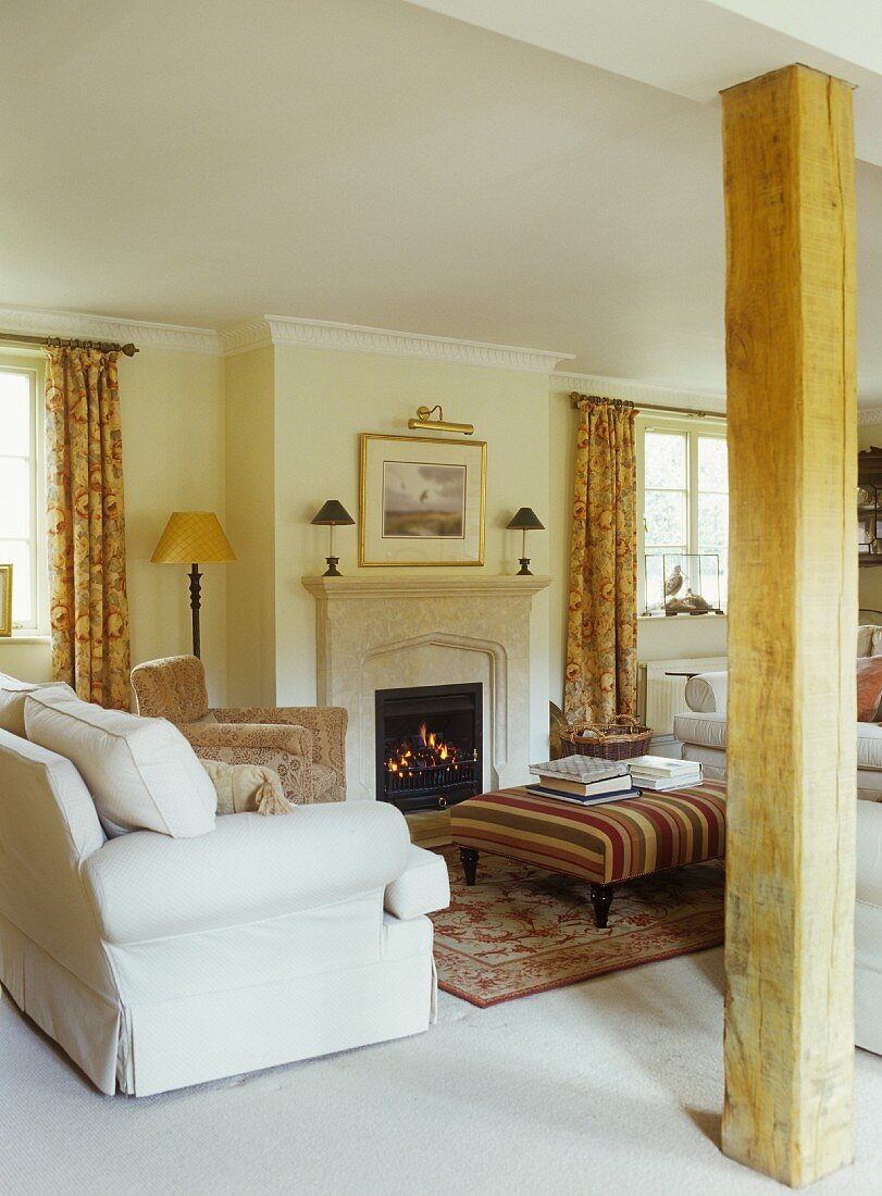 Traditional, country house living room with cosy open fire
