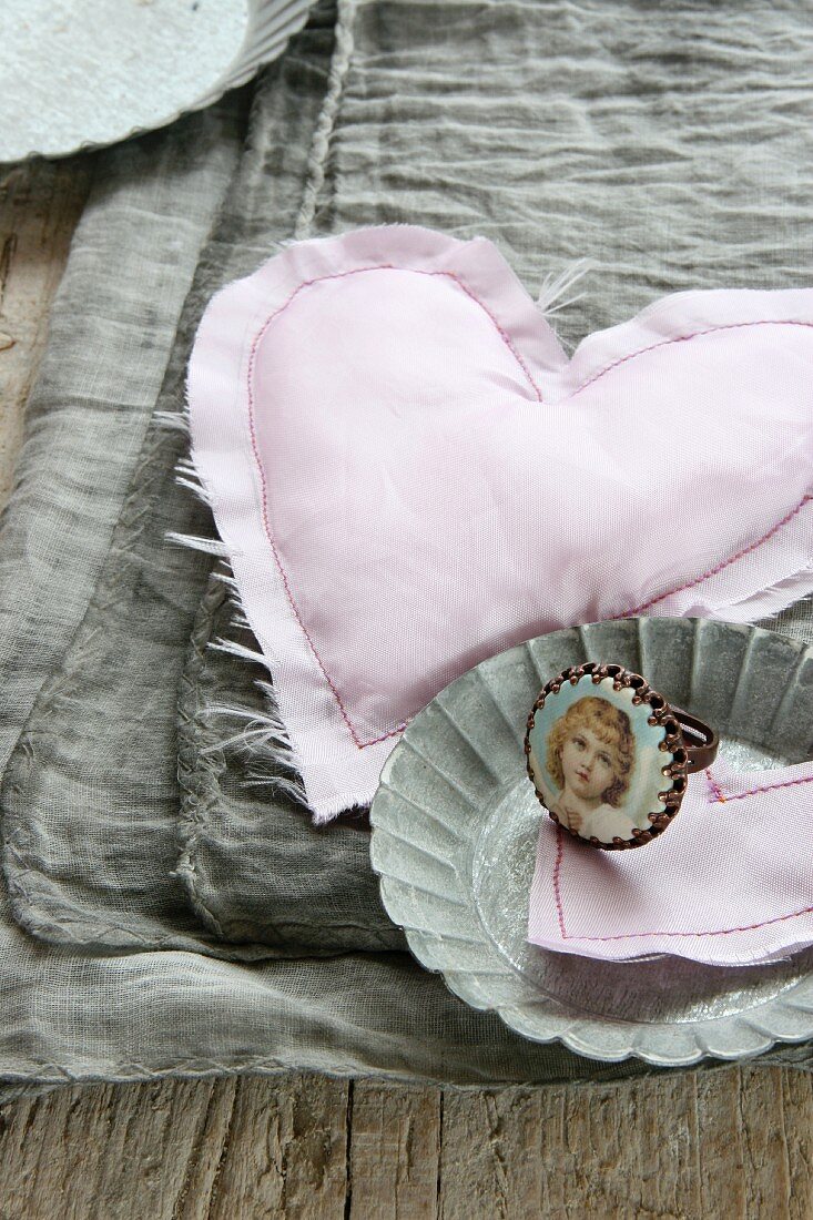 Home-made silk hearts and a ring