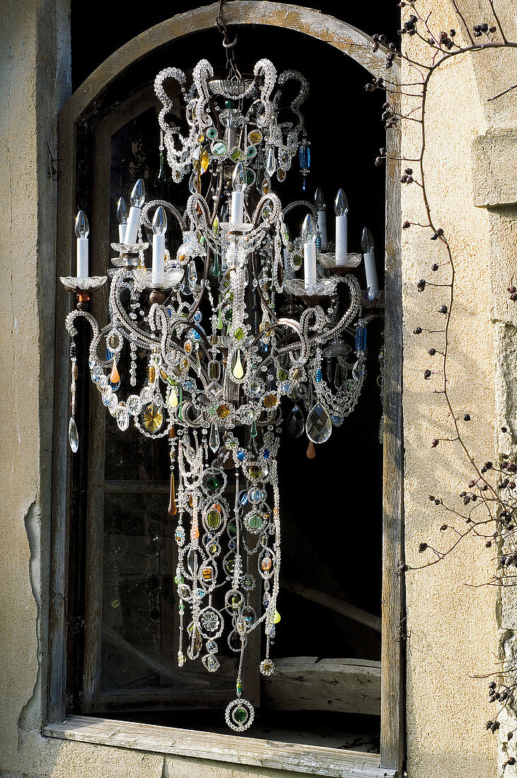 Chandelier decorated with crystal beads and colourful glass beads