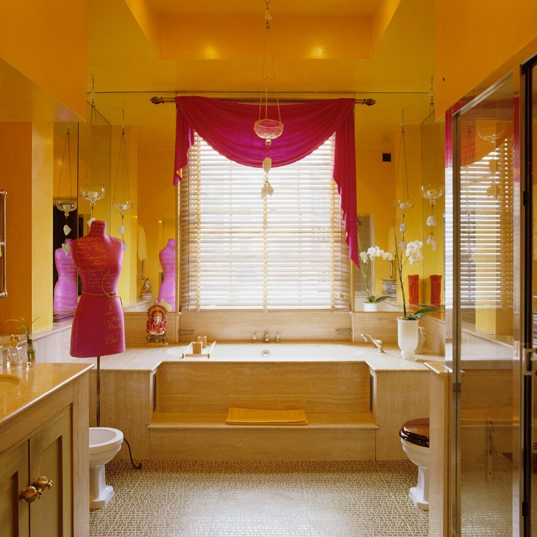 Yellow walls in bathroom with Oriental touch