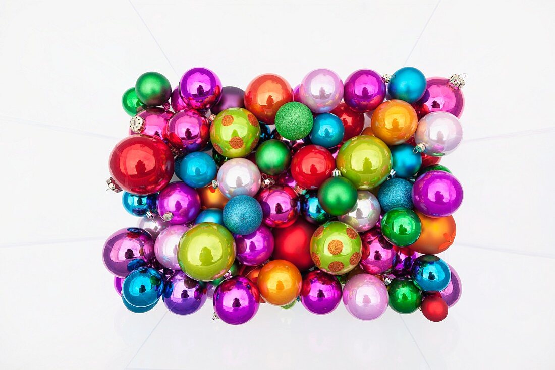 Many colourful Christmas tree baubles