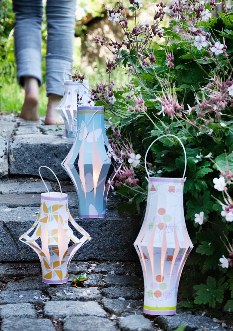 Hand-crafted lanterns on garden steps