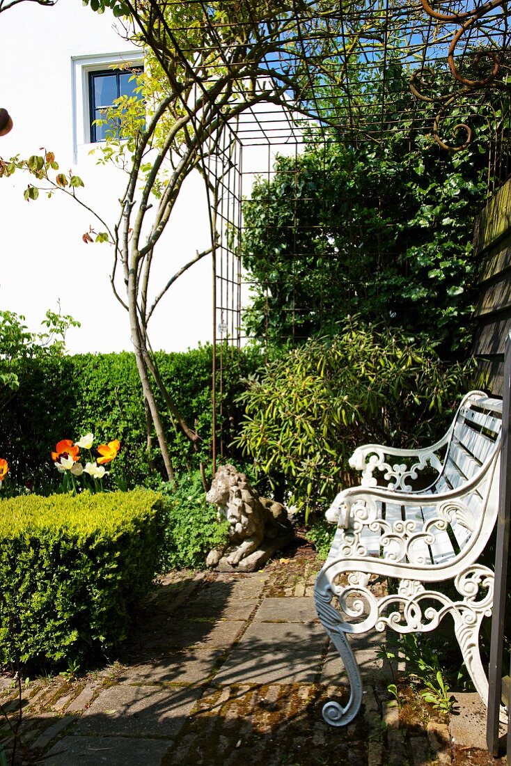 Romantic bench in spring garden