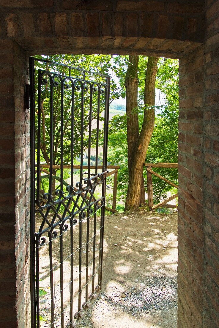 Brick walls and wrought iron gate