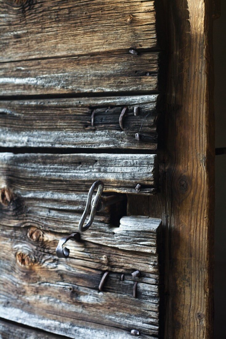 Old wooden chapel door with key