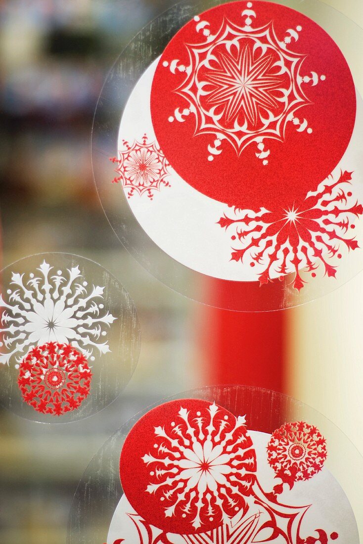 Window decorated with Christmas decals, close-up