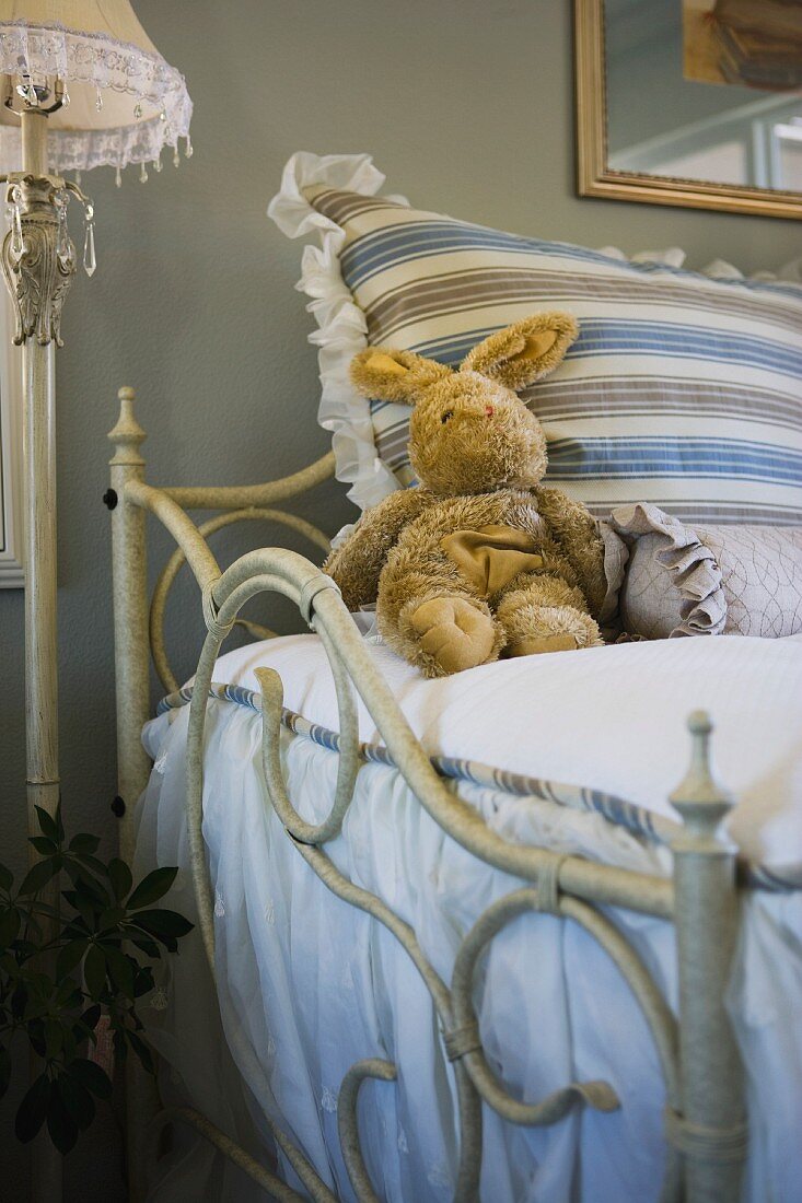 Stuffed bunny on bed