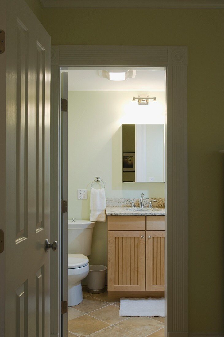 Doorway to small traditional bathroom