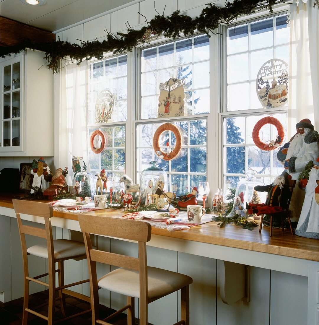 Kitchen window above long counter, festively decorated