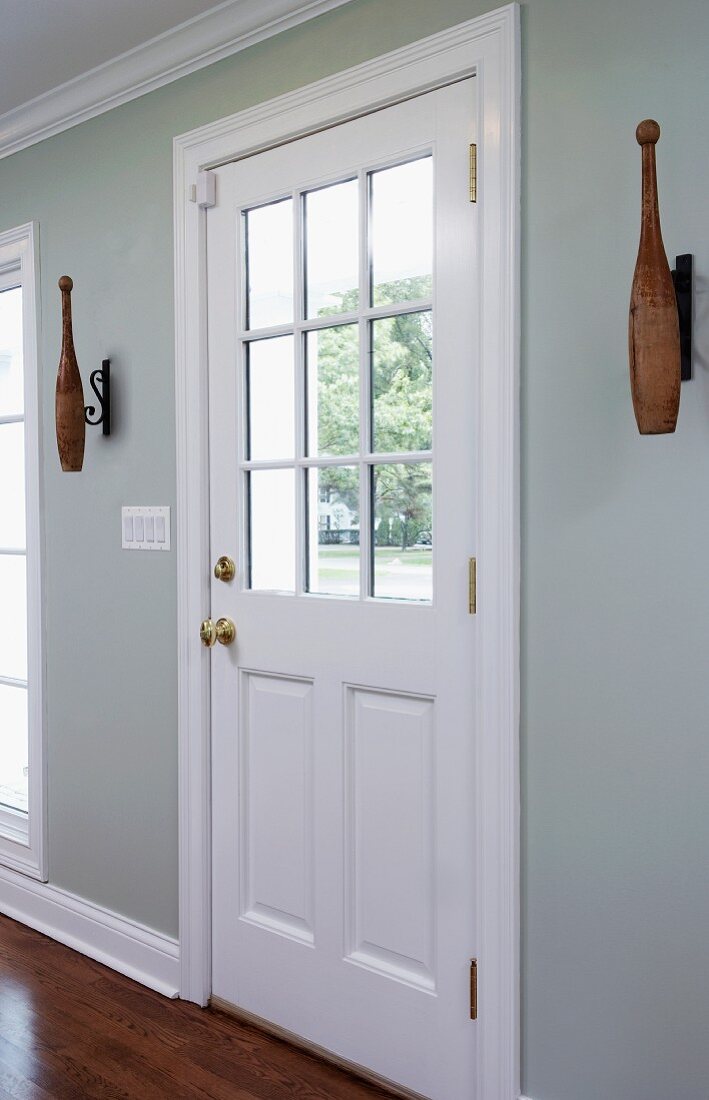 White front door with window element