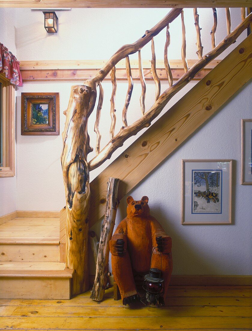 Unusual driftwood banister in stairwell