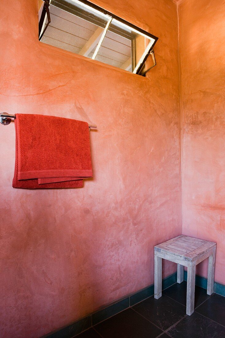 Small red shower room in a pool house