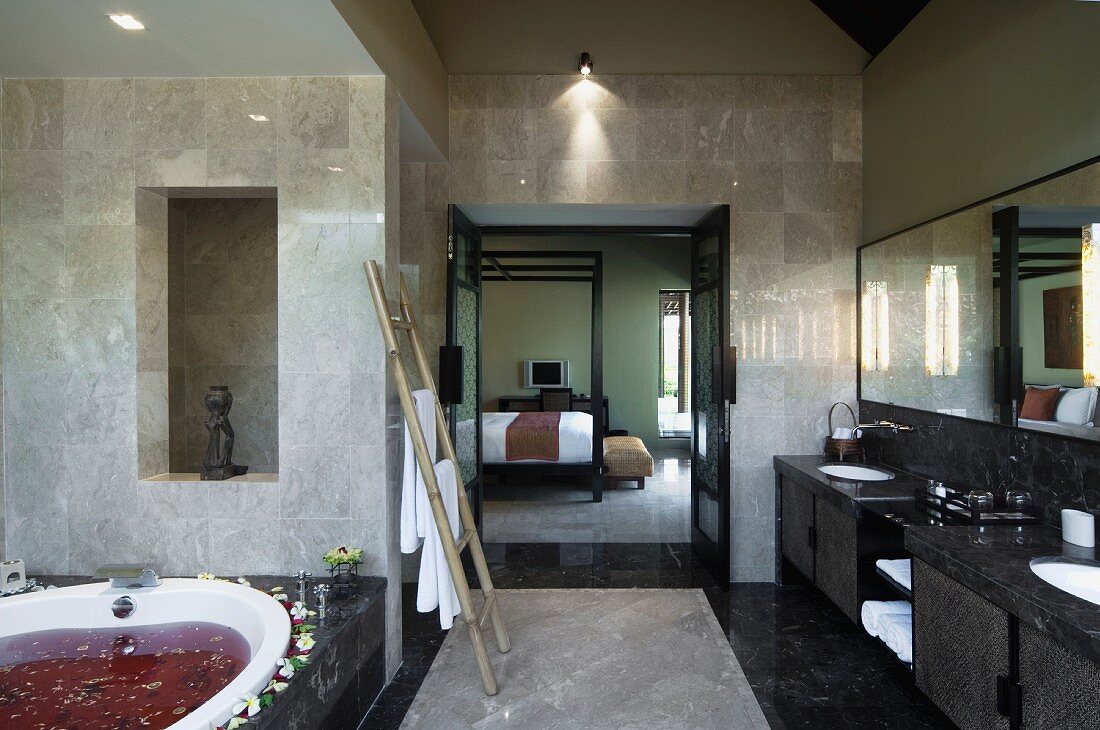 Large master bathroom with spa treatment in bathtub