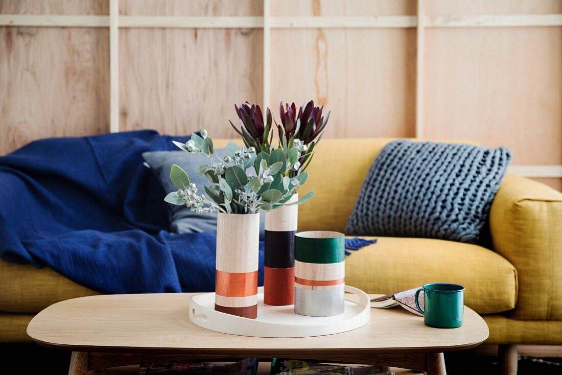 Plywood vases with colored stripes