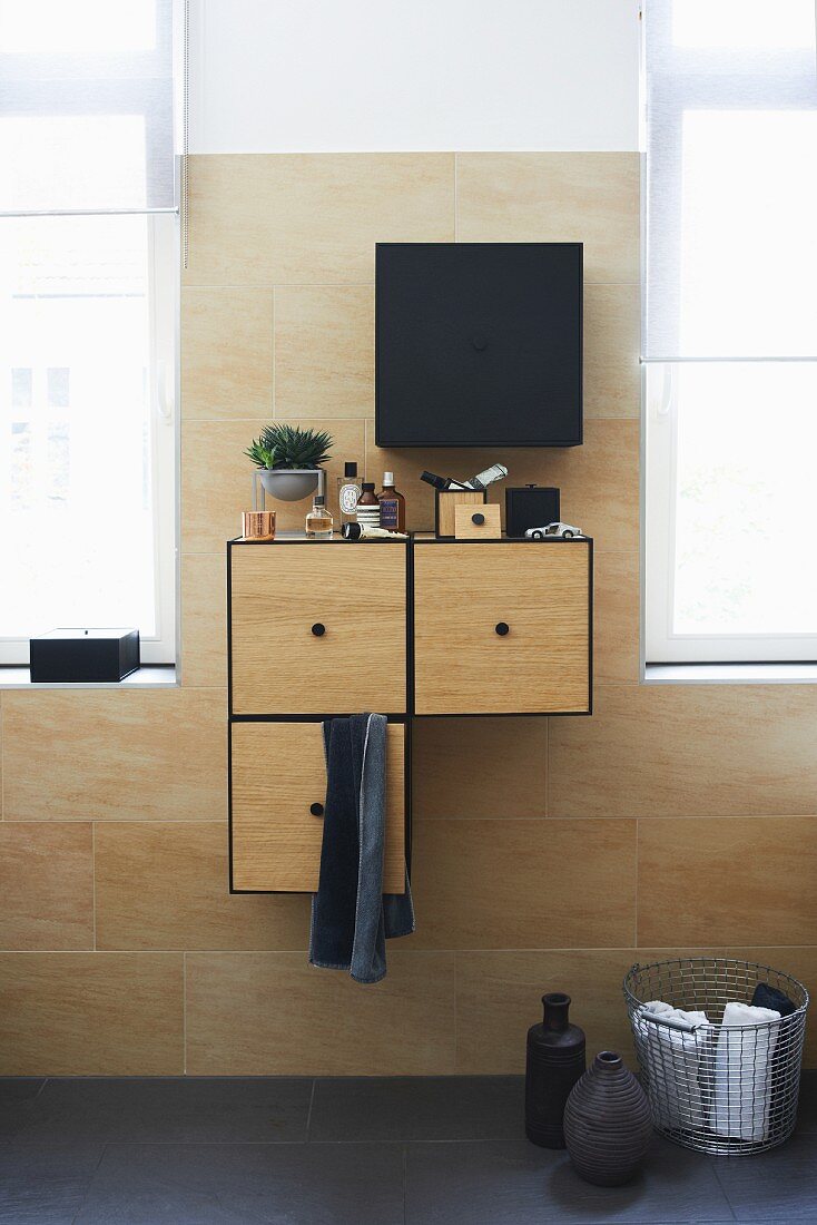 Wall-mounted cabinet in bathroom
