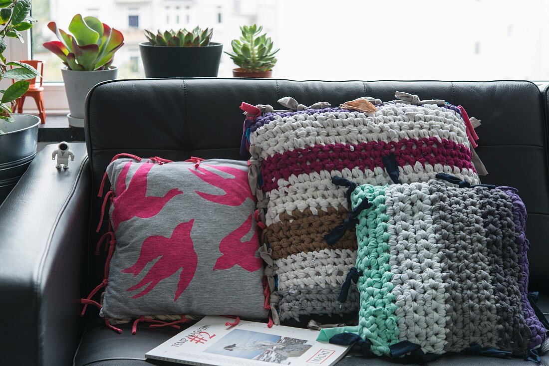 Various sewn and crocheted decorative cushions