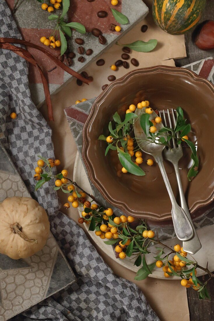 Sea buckthorn branches decorating autumn table