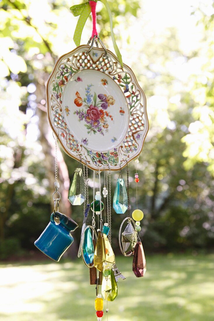 Wind chime hand crafted from old plate and glass beads