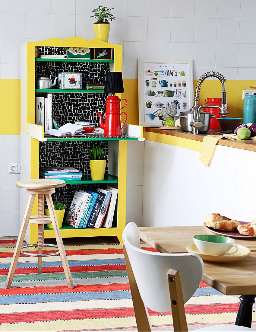 Upcycled kitchen shelves with small table made from vintage baby-changing cabinet