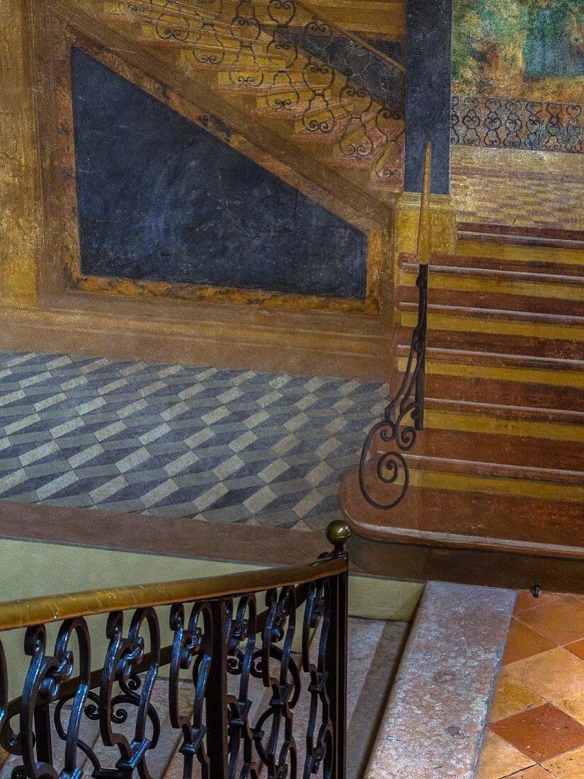 Staircase and trompe l'oeil fresco in palazzo