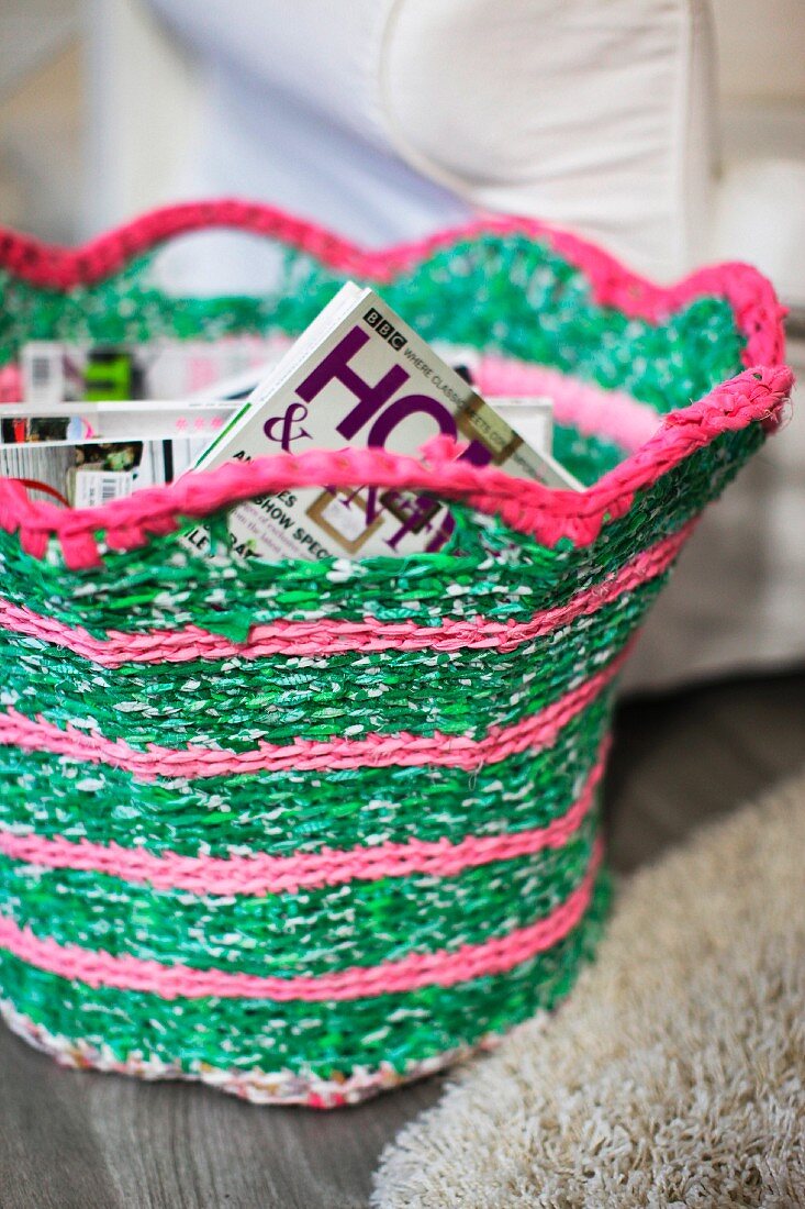 Green and pink magazine basket