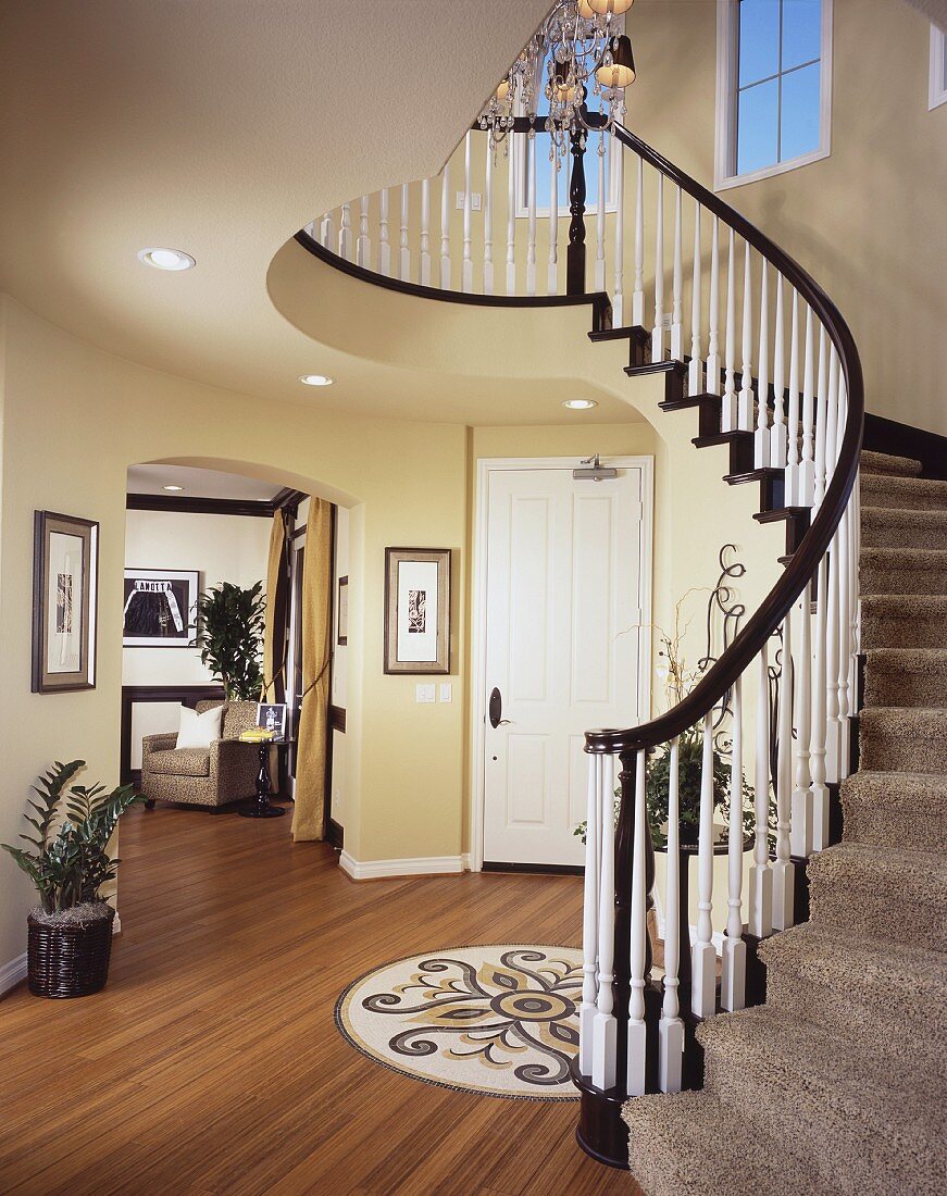 Brown and white balustrade on staircase in contemporary house