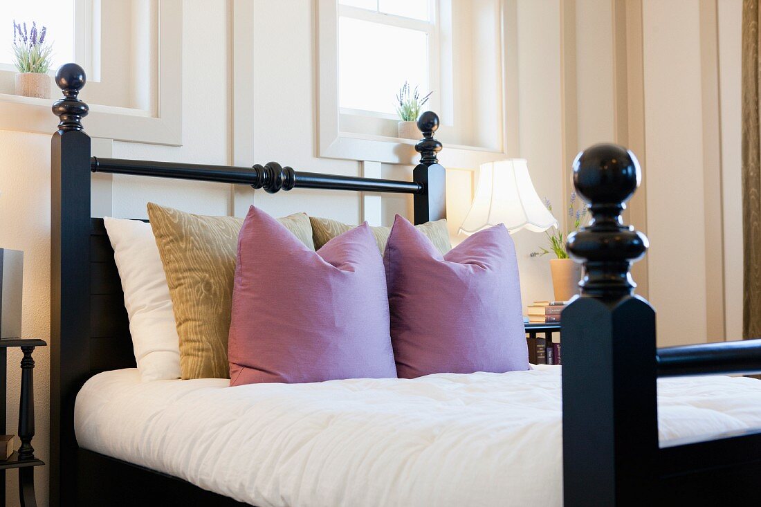Cushions arranged on bed; Valencia; California; USA