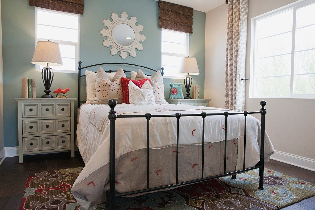 Table lamps flanking bed in contemporary bedroom