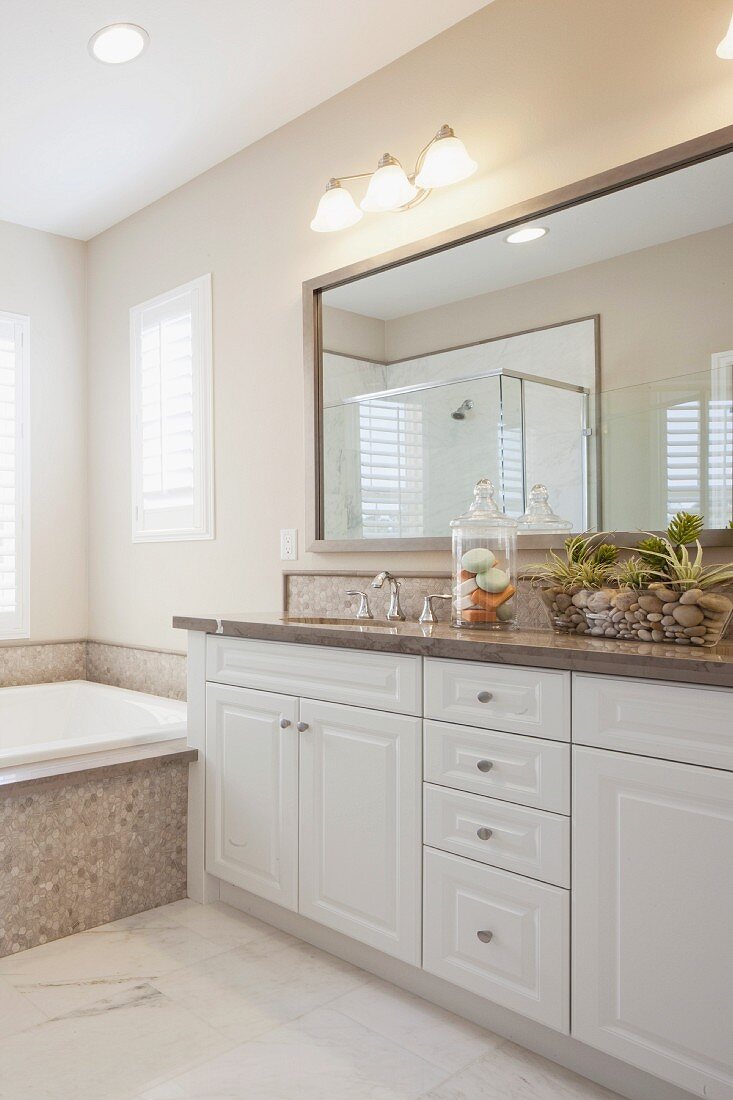 Bathroom with cropped bath and cabinets; Palm Desert; California; USA
