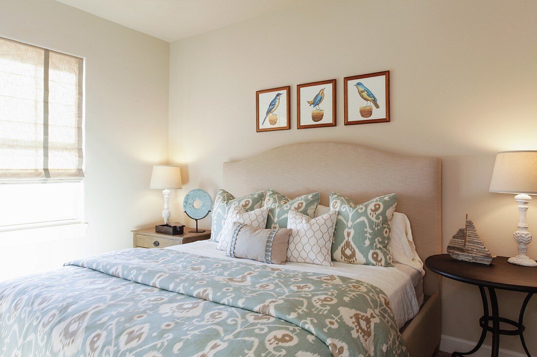 Table lamps by bed in bedroom; Santa Fe; New Mexico; USA