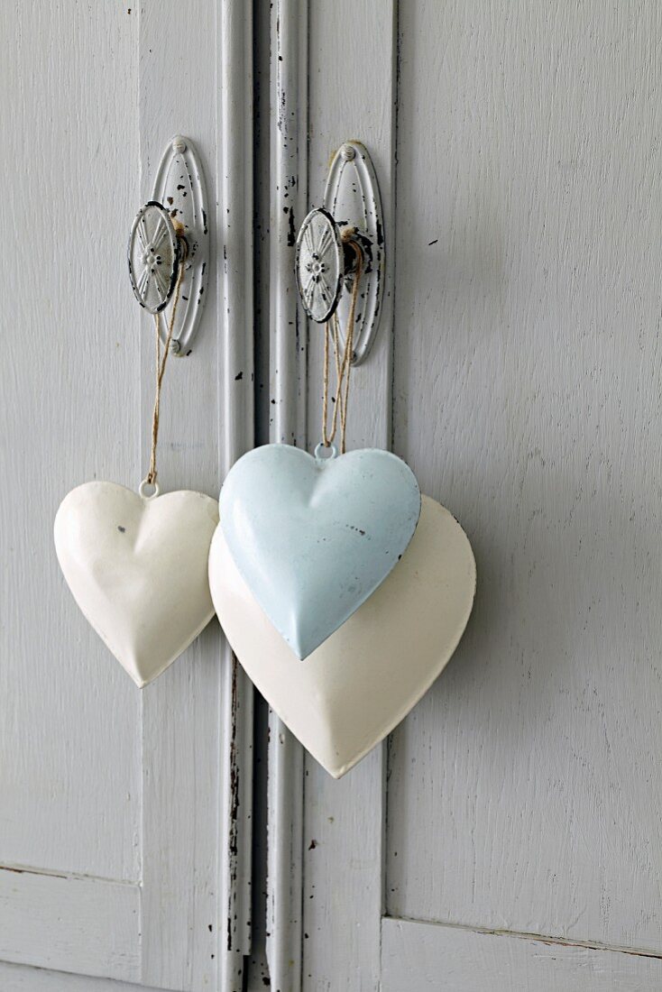 Heart shaped decorations hanging on handle