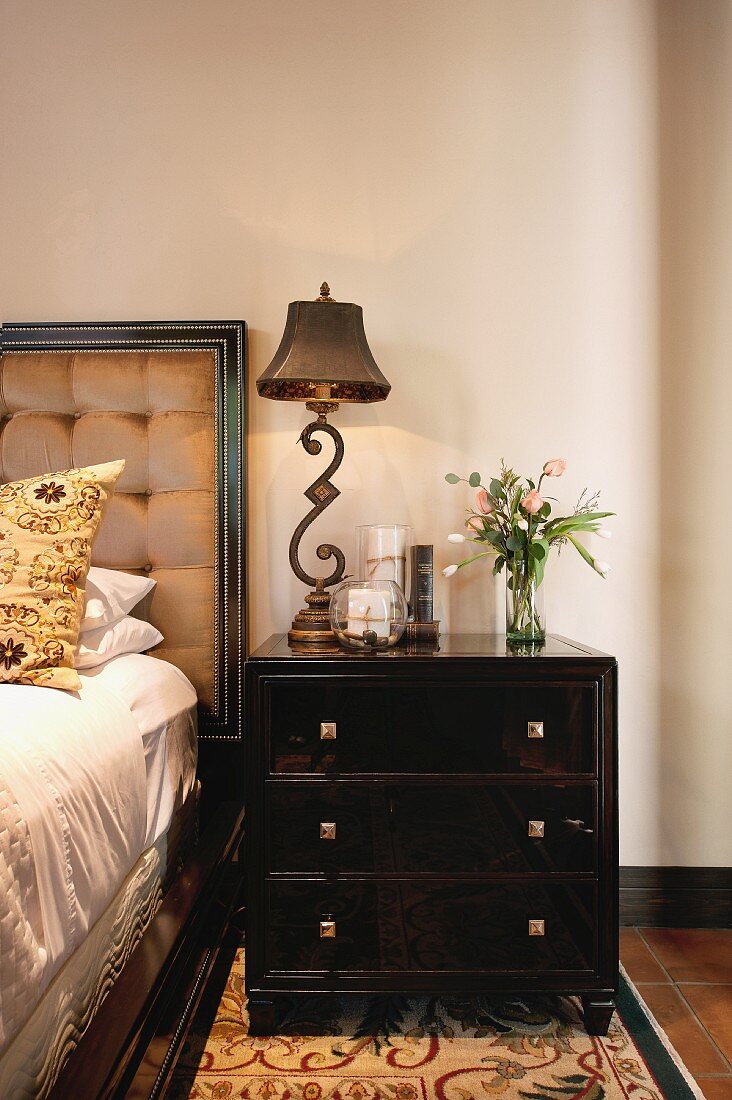 Bedside table with antique lamp