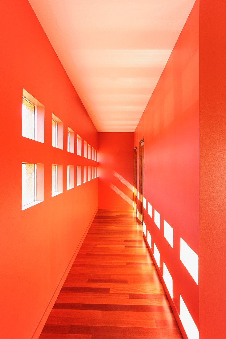 Narrow hallway with pink walls and block windows in Santa Fe; New Mexico; United States