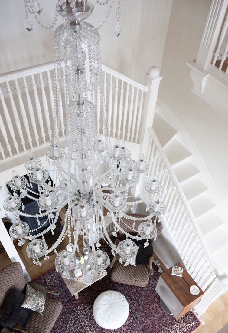 View down into villa foyer with Venetian-style, glass chandelier