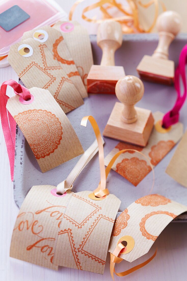 Hand-crafted kraft paper tags printed with stamped motifs