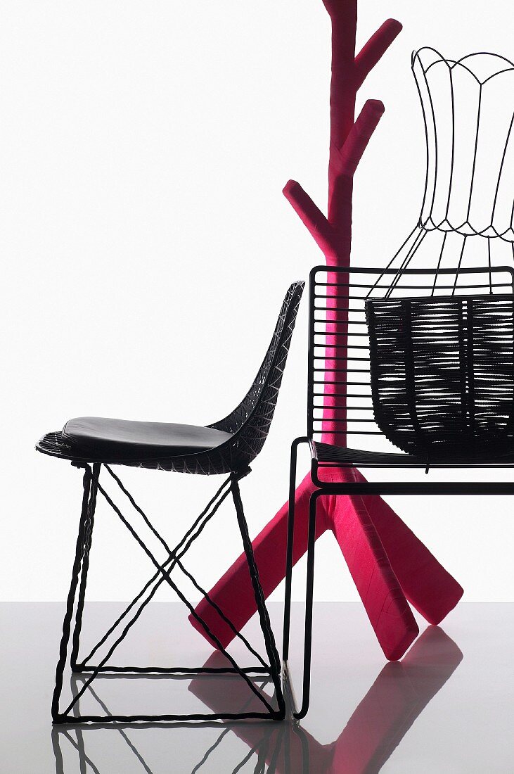 Wire mesh chairs, basket with wire frame and coat stand wrapped in pink cover