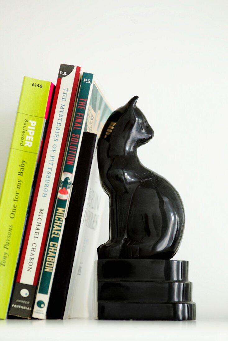 Black, cat-shaped bookend