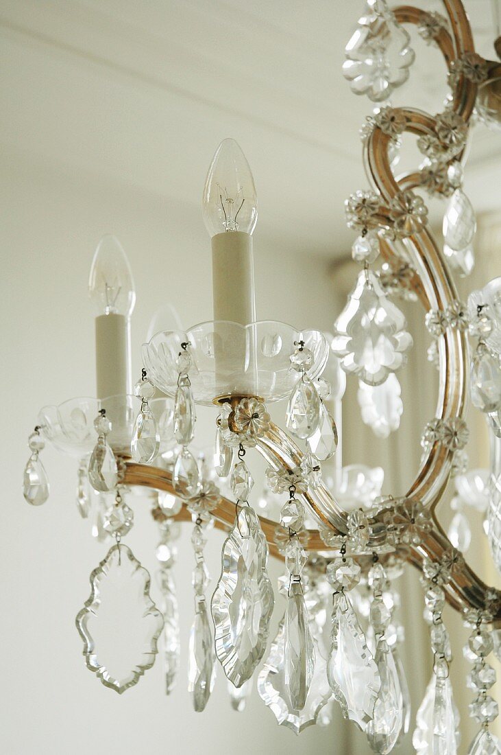 Detail of traditional chandelier with crystal pendants