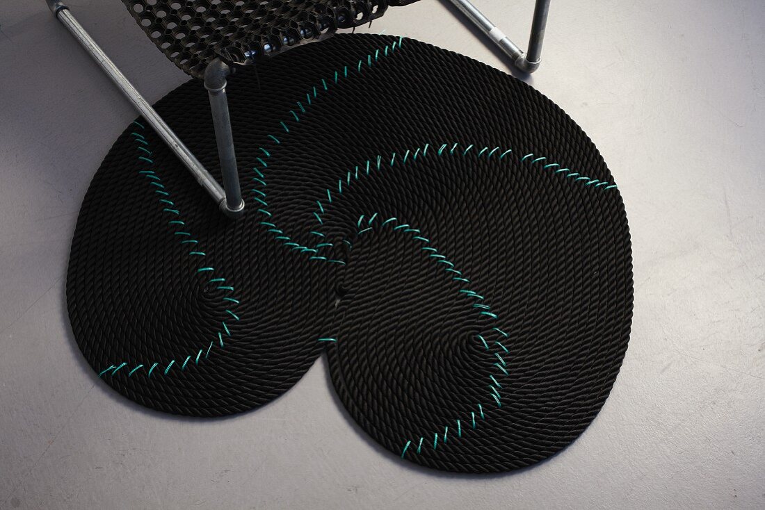 DIY black rope rug with turquoise pattern