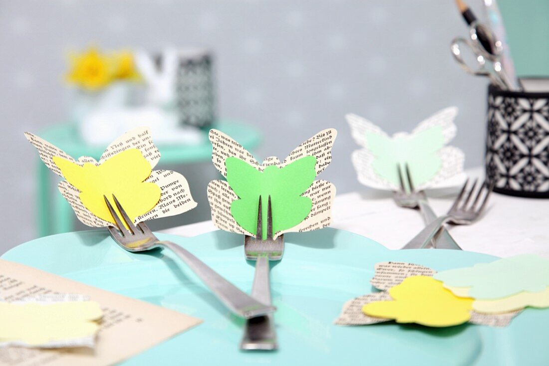 Yellow and green Easter arrangement of paper butterflies attached to forks