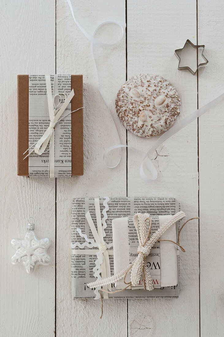 Festive gift-wrap ideas using recycled paper and ribbons