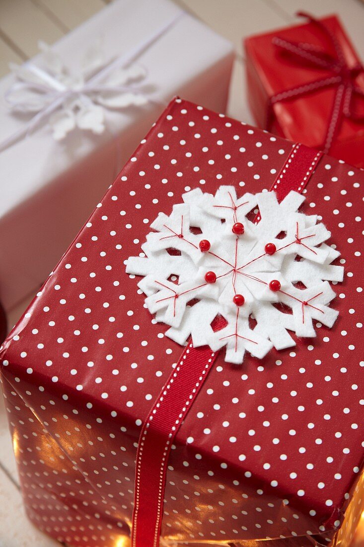 Felt snowflake decorating wrapped gift