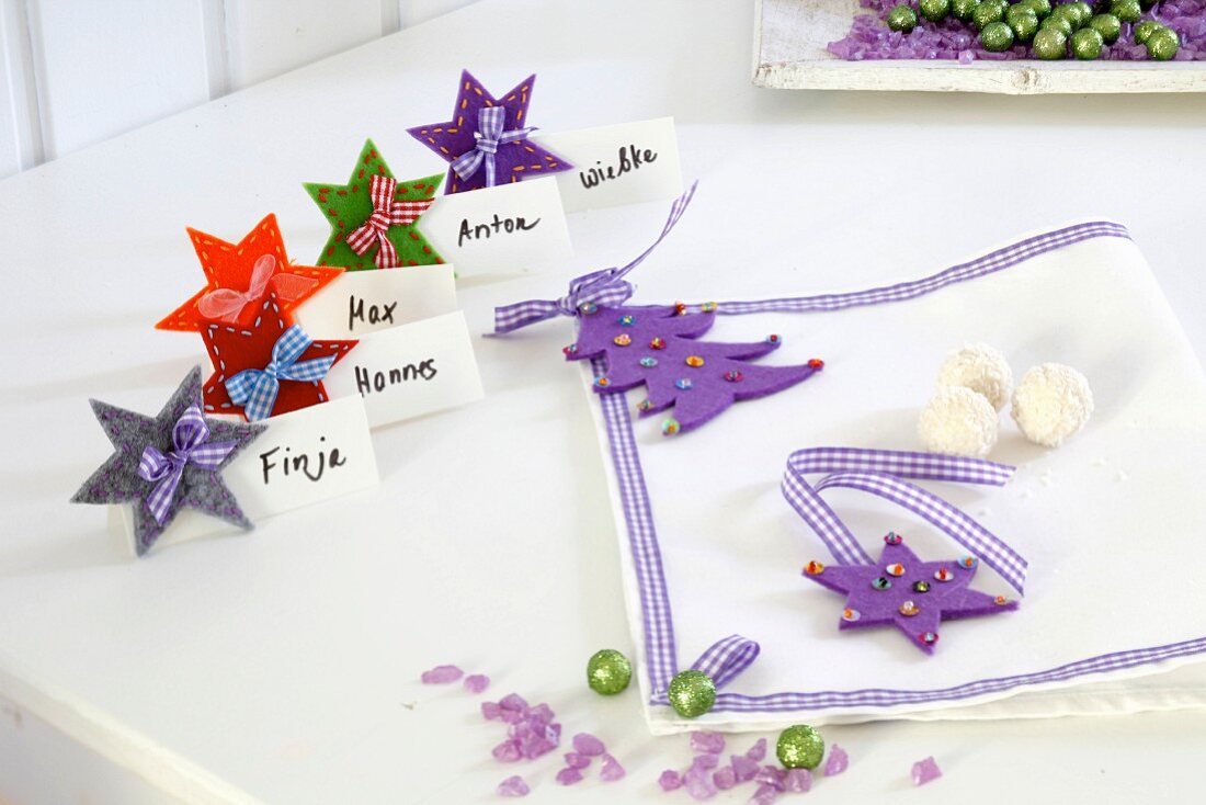 Hand-crafted, festive felt name tags and napkin decorations