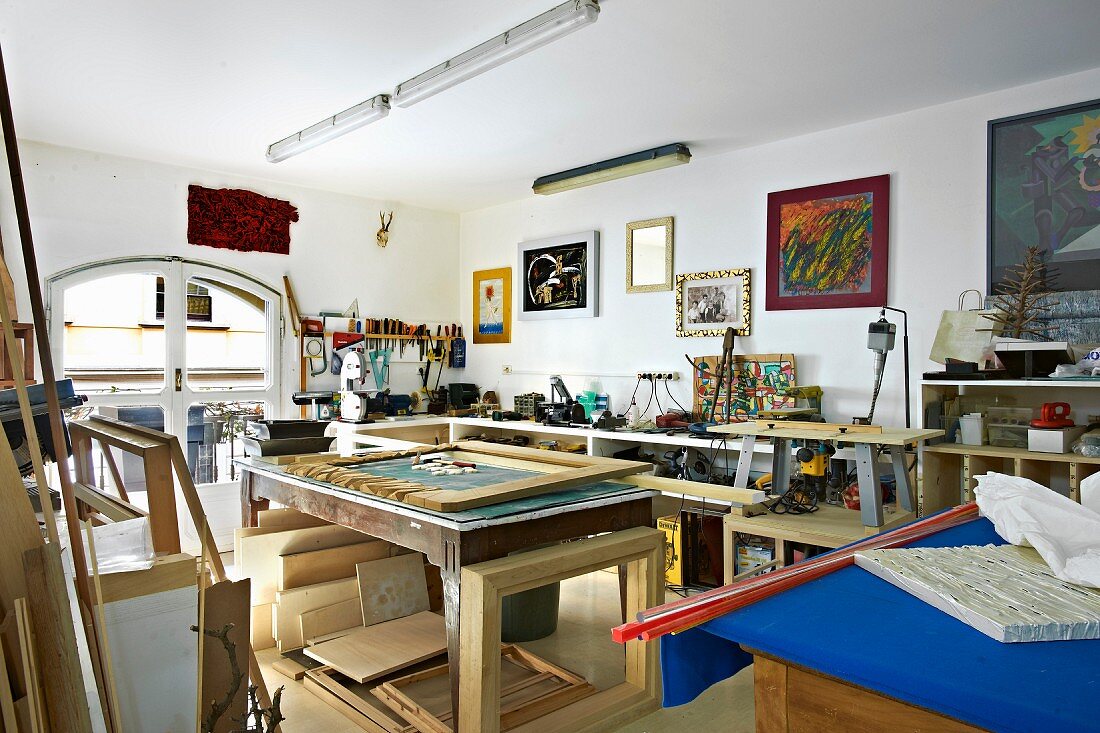Various shelves and materials in artist's workshop