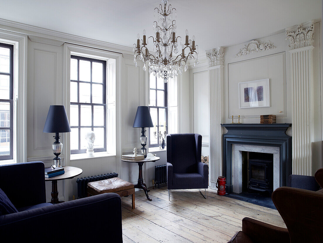 Open fireplace and lattice windows in classic living room