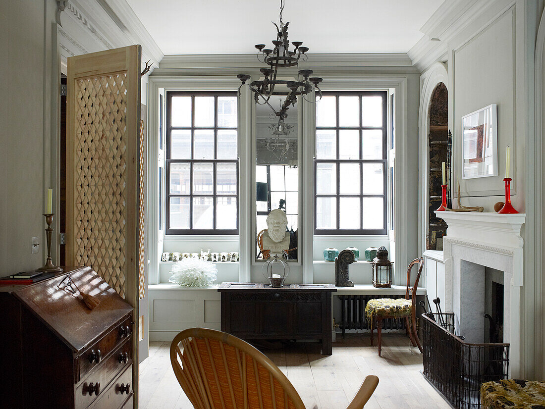 Lattice windows and stucco frieze in classic living room