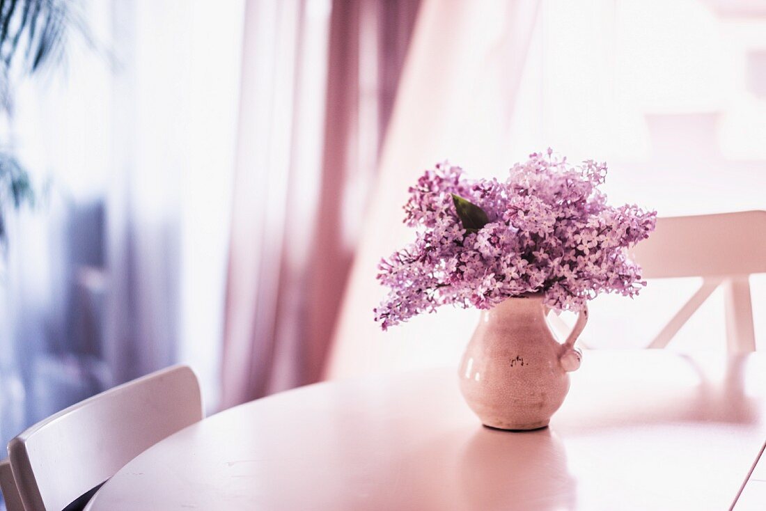 Bouquet of lilac in jug